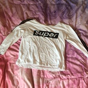 Black and white shirt with rainbow lines on sleeve